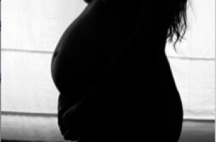 How does pregnancy reduce breast cancer risk?